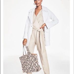 Aqua snakeskin tote. Snakelike skin material. Tan